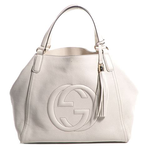 gucci fioletowe|white Gucci handbag.